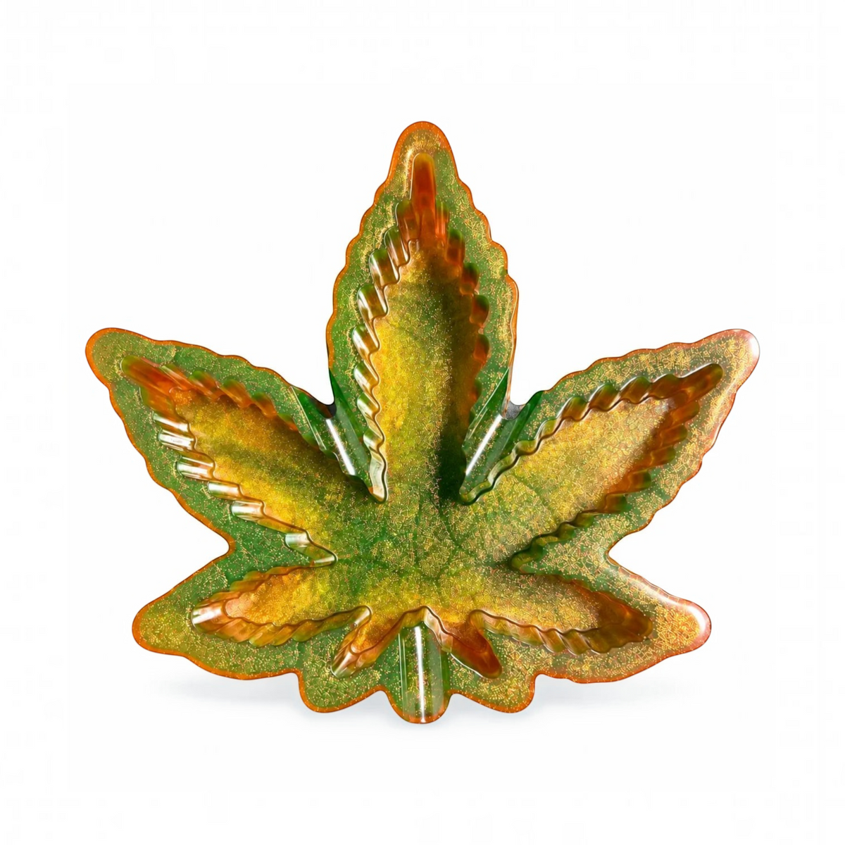 White Ashes Smoke Shop cannabis leaf shaped resin rolling tray in shimmering green and gold with a high-gloss finish.