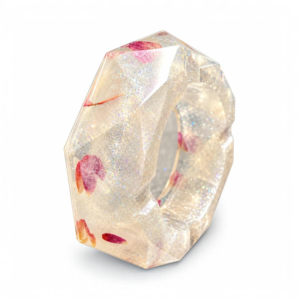 White Ashes Smoke Shop hexagonal resin ashtray with silver glitter and dried rose petals in a clear geometric design.