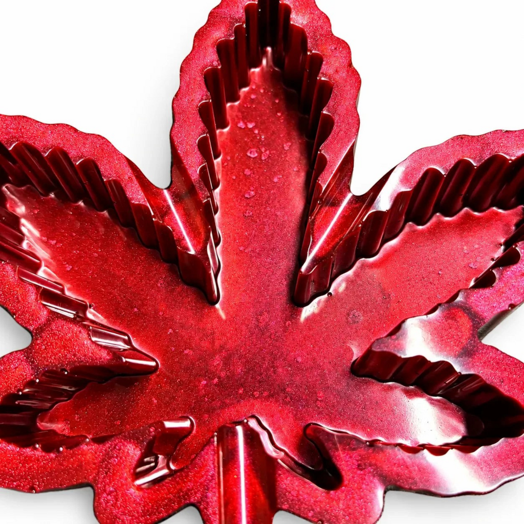 White Ashes Smoke Shop red glitter resin leaf shaped smoking accessory tray with a high gloss finish