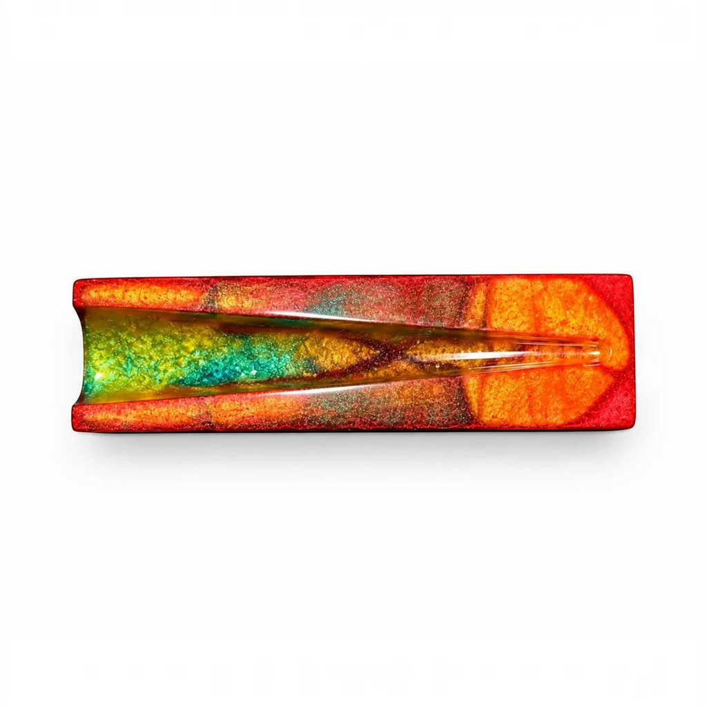 White Ashes Smoke Shop resin rolling tray featuring a sunset-inspired swirl of red, yellow, and teal with a gloss finish