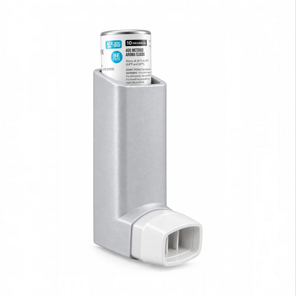 White Ashes Smoke Shop AFX GID metered aroma cloud inhaler in a sleek silver handheld device with a white mouthpiece.